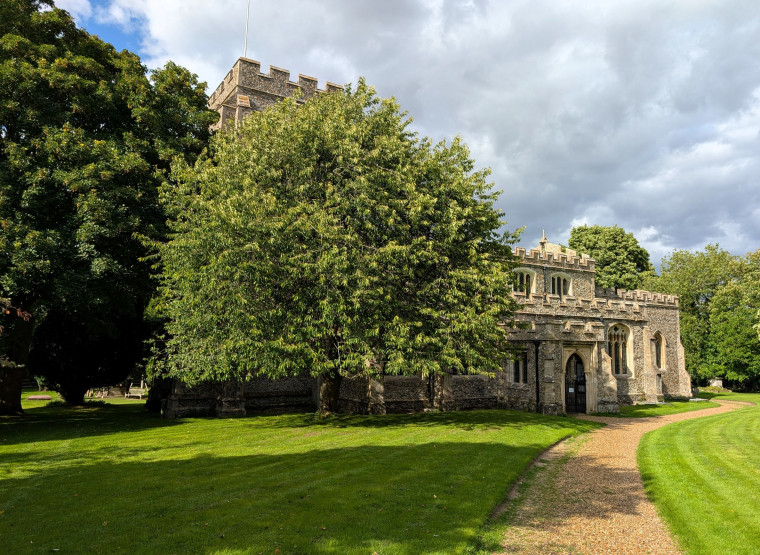 Clavering church from gate  5 August 2025 Copyright: William George