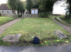 Boulders at entrance to church looking south