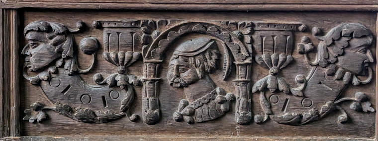 Gosfield Church Wooden Paneling with faces 21 March 2025 Copyright: William George
