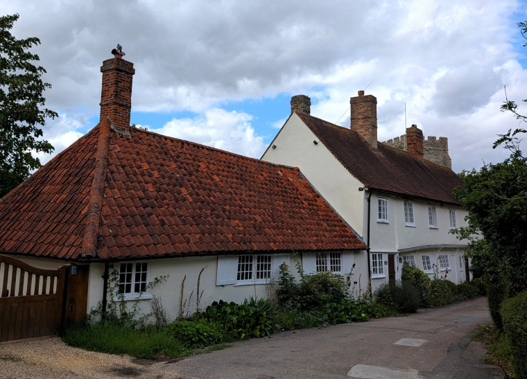 Clavering Church nearby cottages 5 August 2025 Copyright: William George