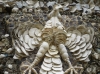 Flint fossil shells used to make a model bird on the Shell House