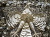 Flint fossil shells used to make a model bird on the Shell House 