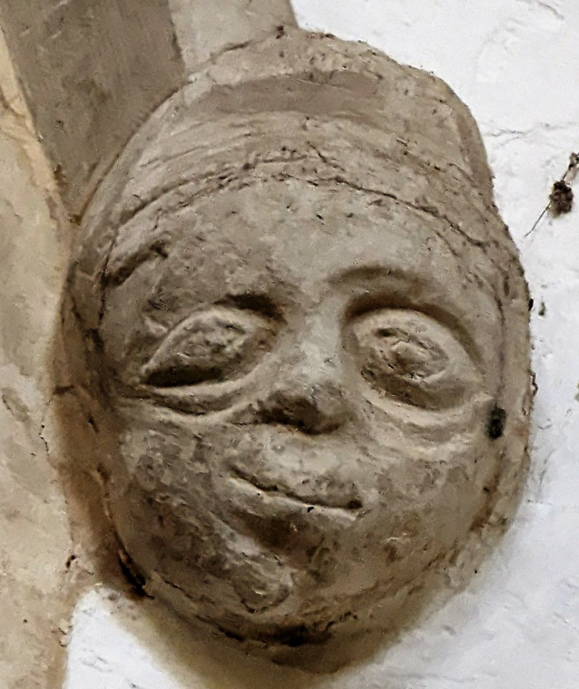 Wendens Ambo Church Interior Carved Skewed Face 7 August 2022 Copyright: William George