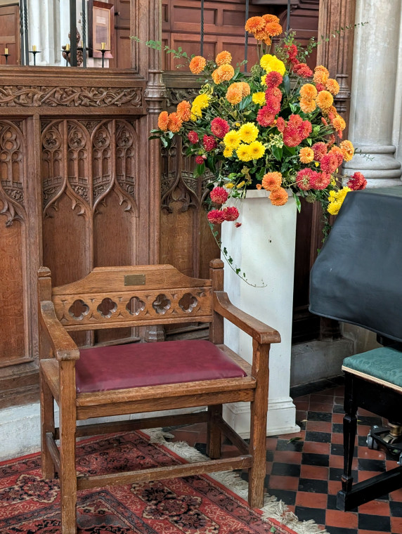 Bocking Church Chair and Flowers 7 October 2025 Copyright: William George