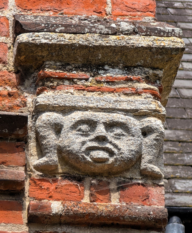 Castle Hedingham Church Face with Legs 8 August 2025 Copyright: William George