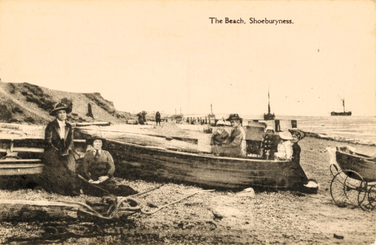 Shoeburyness The Beach Boat Ladies and Sloped Cliff Copyright: post Card