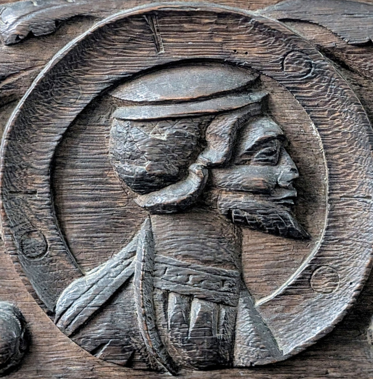 Gosfield Church Wooden Paneling with male face 21 March 2025 Copyright: William George