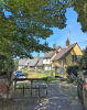 Wendens Ambo Cottages and church with trees 7 August 2022
