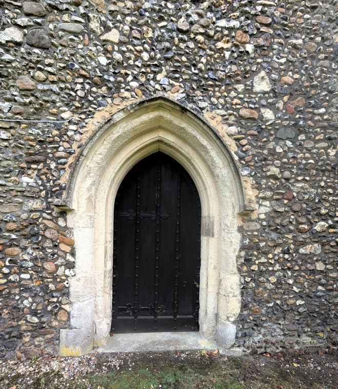 Bocking Church Doorway with flint wall 7 October 2025 Copyright: William George