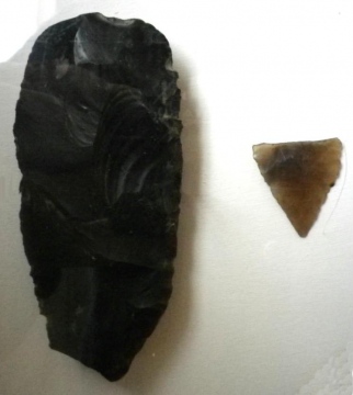 Typical Neolithic arrowhead and partly worked axe or celt Copyright: Michael Daniels