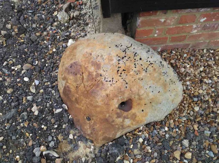 Sarsen stone at corner of building at Harps Farm Copyright: Mike Howgate