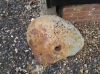 Sarsen stone at corner of building at Harps Farm
